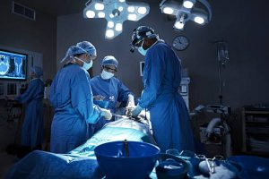 Shot of a team of surgeons performing a surgery in an operating room