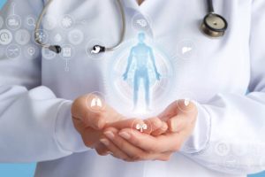 Doctor shows a hologram of a patient on a blue background.